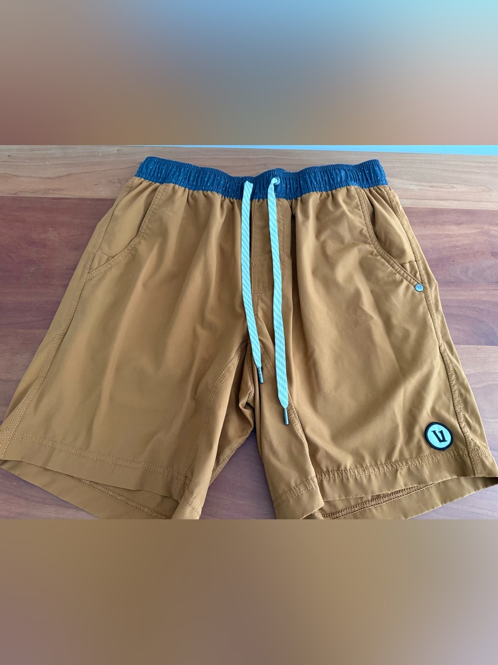 Vuori rust orange short with lining. 7”